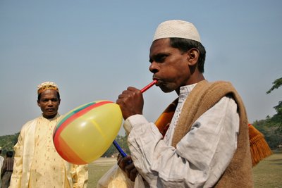 Portrait of a Muslim Father Inflating a Balloon Flute by Unbekannt Unbekannt